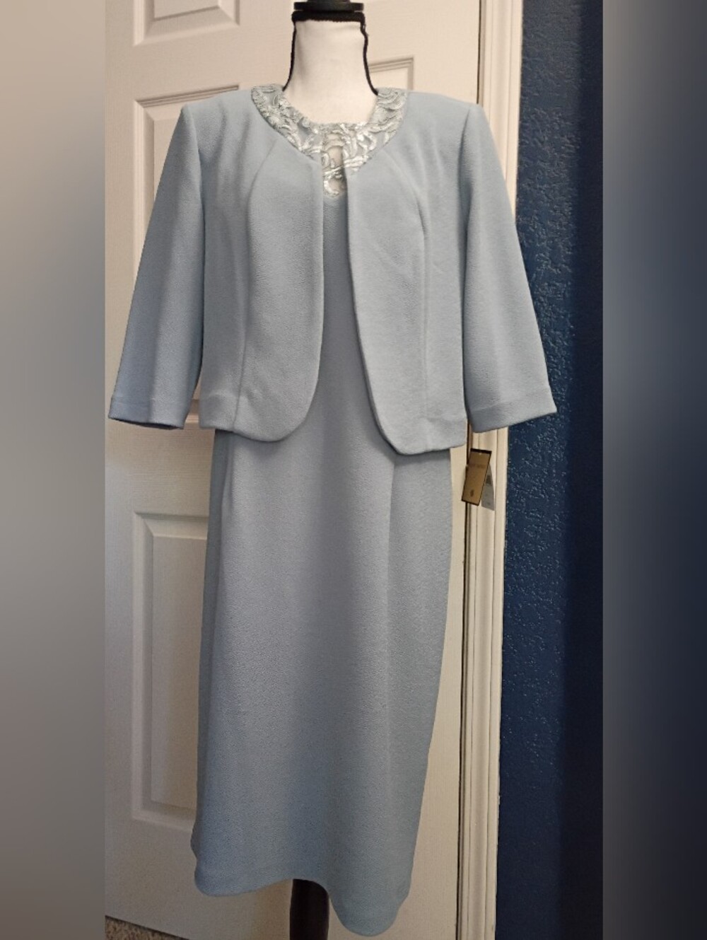 Elegant Light Blue Women's Dress with Matching Jacket